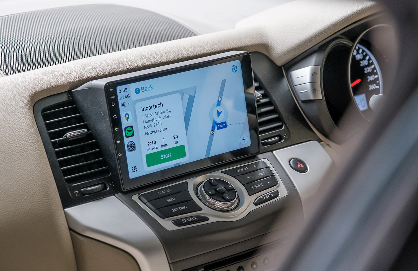 Car dashboard with a touchscreen display showing navigation.