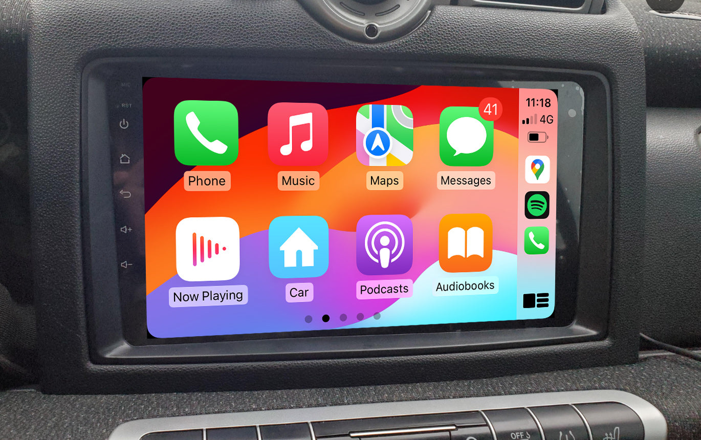 An image showing a 9-inch GPS infotainment system with a touchscreen interface displaying icons for phone, music, maps, messages, and other functions, installed in a vehicle.