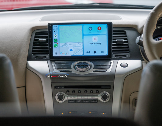Car dashboard with a navigation system displaying a map and interface.