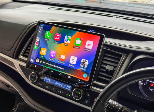 Car dashboard with a touchscreen display showing app icons